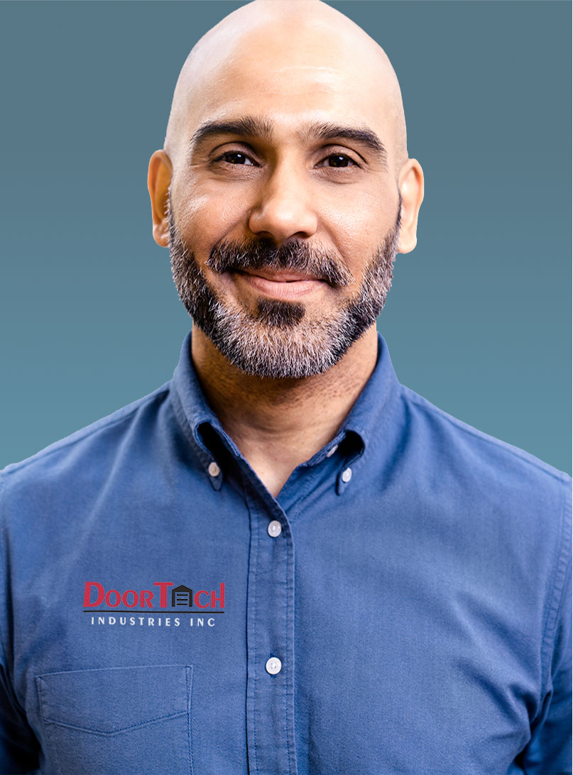 gentleman in a shirt with a corporate logo stitched