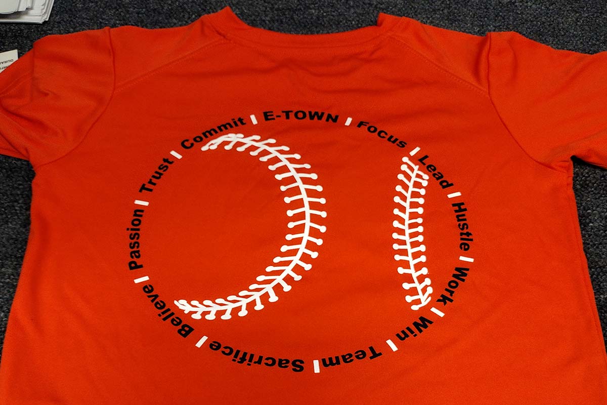red t-shirt with custom baseball artwork